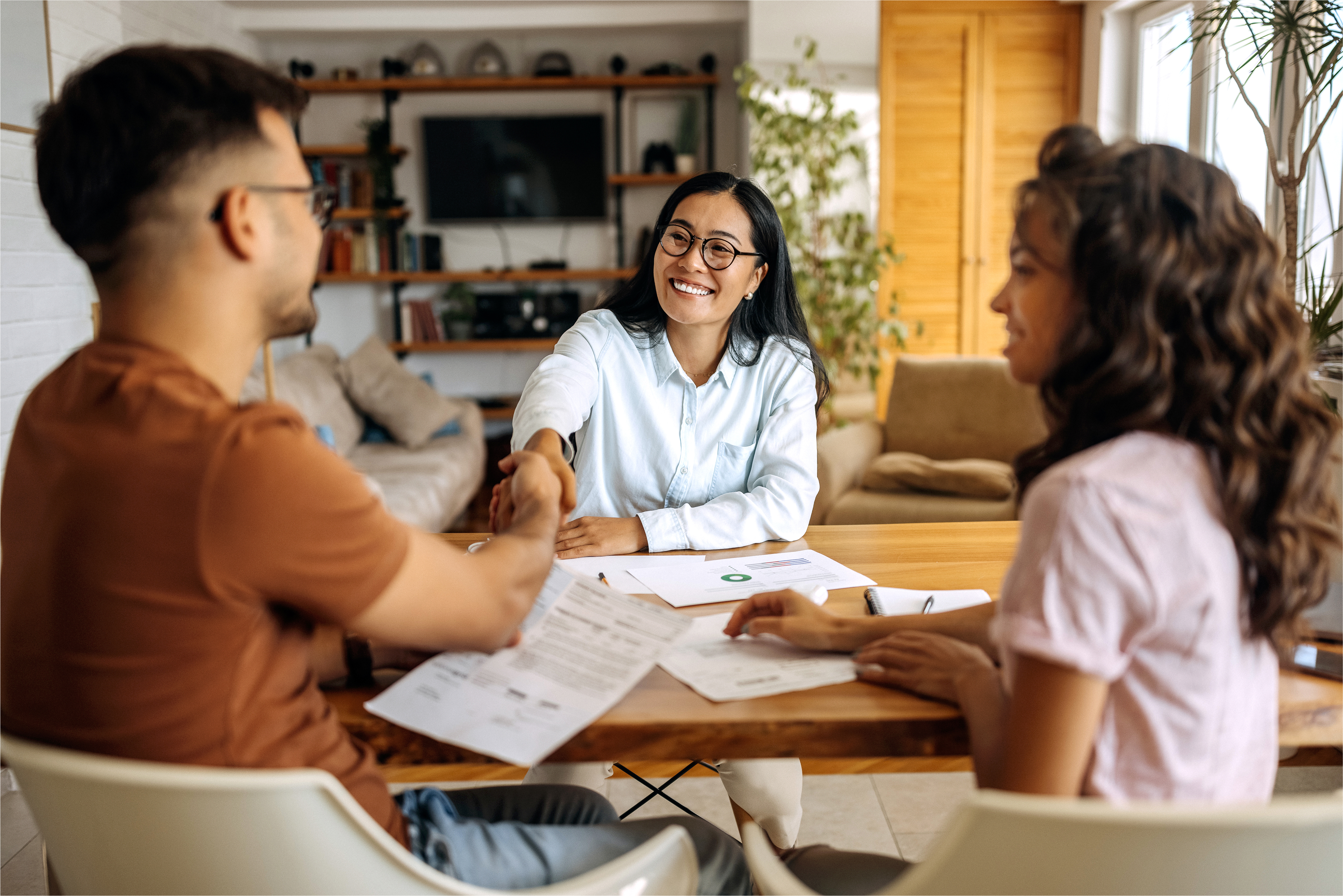 Handsome insurance man smiles. biBerk has insured him. He is happy and secure.