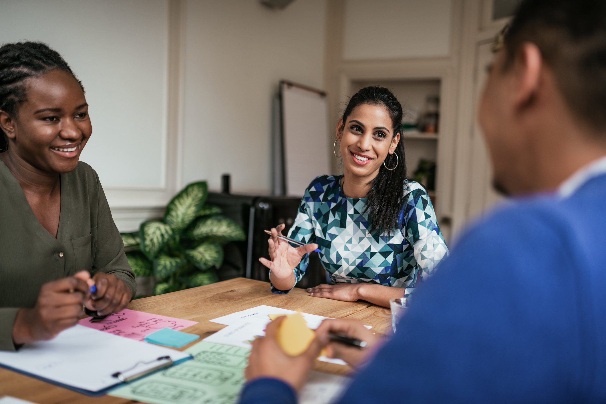 Woman helping clients